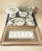 A group of Wedgwood green Jasperware including a Dancing Hours plaque in frame, a planter,