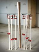 A group of clamps and a concrete level.