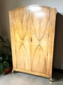 A mid-20th century figured walnut double door wardrobe, 117 cm x 49 cm x 198 cm.