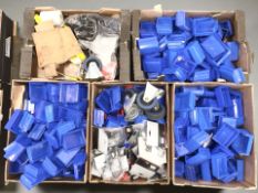 A quantity of trolley castors, Audi iPod / iPhone car adapters, small plastic filing drawers, etc.