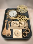 A pair of carved wooden ash trays surmounted by squirrels, pair of napkin rings,