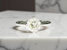 A platinum diamond solitaire ring, the brilliant-cut stone weighing an estimated 1.09 carat, size M.