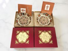 A pair of Royal Crown Derby Imari porcelain circular pin dishes, pattern 1128, date codes for 1974,