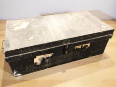An early 20th century tin trunk, width 77 cm.
