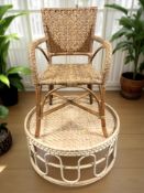 A wicker and bamboo circular coffee table, diameter 80 cm, and an Edwardian similar armchair.