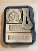 Four early 20th century Korean brass wall plaques, the longest 29 cm.