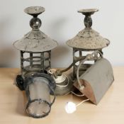 A pair of antique metal hanging lanterns,