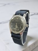 A gent's Second World War and later stainless steel Timor military issue Army Trade Pattern