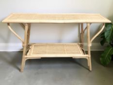 A bentwood bamboo and caned contemporary side table, width 125 cm.