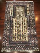 A Balouch prayer rug, Afghanistan, 149 cm x 91 cm.