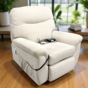 An electric reclining armchair in oatmeal fabric, width 107 cm.