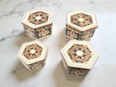 Four Royal Crown Derby hexagonal Imari porcelain trinket boxes, pattern A.1297, the larger two 6.