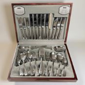 A canteen containing a fifty piece service for six persons of Viners stainless steel cutlery.