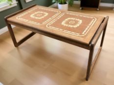 A teak tile inset rectangular coffee table, width 97 cm.