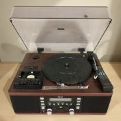 A Teac record player with remote.