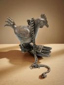 An Eastern painated metal figure of a rooster,