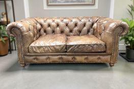 A contemporary Barker & Stonehouse two seater Chesterfield club settee,