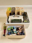A small group of boxed die cast cars including Days Gone, modern figurines including Playmobil.