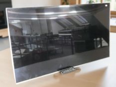 A Samsung 49 inch TV, model UE49KS7000U, with power lead only,