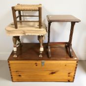 A stained pine blanket box, a camel stool, a small rattan stool and a mahogany occasional table.