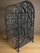 A painted wrought metal bottle rack, width 37 cm.