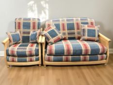 A light elm and caned two seater conservatory settee, width 140 cm, and a matching armchair.