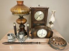 An Art Deco mantel clock and further wall clock, oil lamps, bed warming pan, pewter tankards, etc.