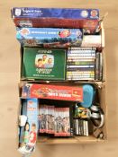 A group of board games, Puffin books, DVDs, cassettes, etc.