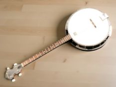 A Samick four string banjo.