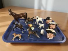 A group of Beswick horses, lambs, and three miniature character jugs.