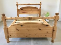 A contemporary carved pine 4ft 6 bed frame.