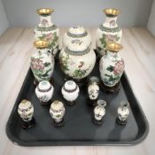 A group of cloisonne enamel vases, ginger jars,