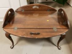 A mahogany butler's tray table, width 90 cm.