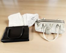 A Max Mara white leather handbag and a further black leather handbag.