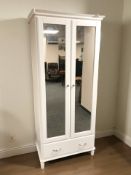 A modern MDF mirrored door wardrobe, with drawer beneath, width 85 cm,