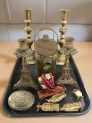 A group of antique brass candlesticks, watering can, ornaments,