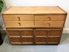 A Nathan teak sideboard fitted cupboards and drawers, 103 cm x 45 cm x 75 cm.