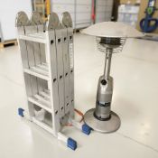 An outdoor patio heater and a folding aluminium roof ladder.