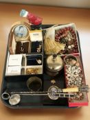 A group of costume jewellery, brass table bed, brass golfing figure door stop, portrait miniature,
