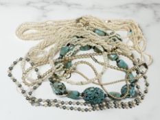 A group of simulated pearl and turquoise necklaces