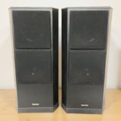 A pair of floor standing Tannoy speakers, height 72 cm.