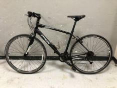 A Specialized Sirrus Sport road bike, frame 19