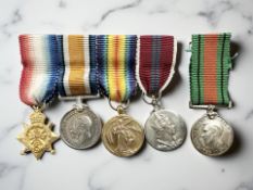 A group of re-struck WWI and later miniature medals, comprising a Mons Star, British War Medal,