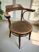 A 1930's bentwood armchair, width 64 cm.