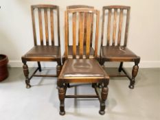 A set of four Edwardian oak dining chairs.