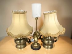 A brass table lamp in the form of a horse, height 23 cm, and a further pair of brass table lamps.