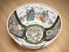 A large Japanese hand painted ceramic bowl,