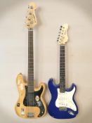 A Westfield bass guitar and a KCC electric guitar.