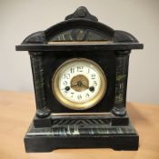 A Victorian ebonised and painted eight day mantel clock, height 32 cm.