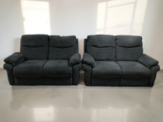 A pair of contemporary two seater settees in charcoal fabric, each 165 cm wide.